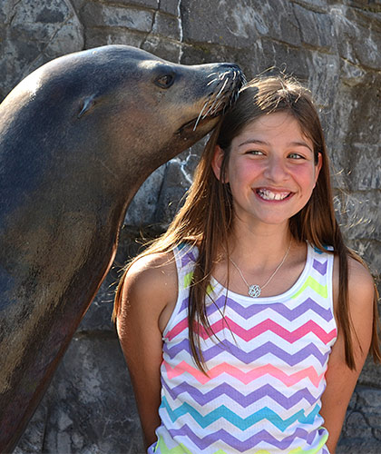 Girl-Getting-a-Sea-Lion-Kiss