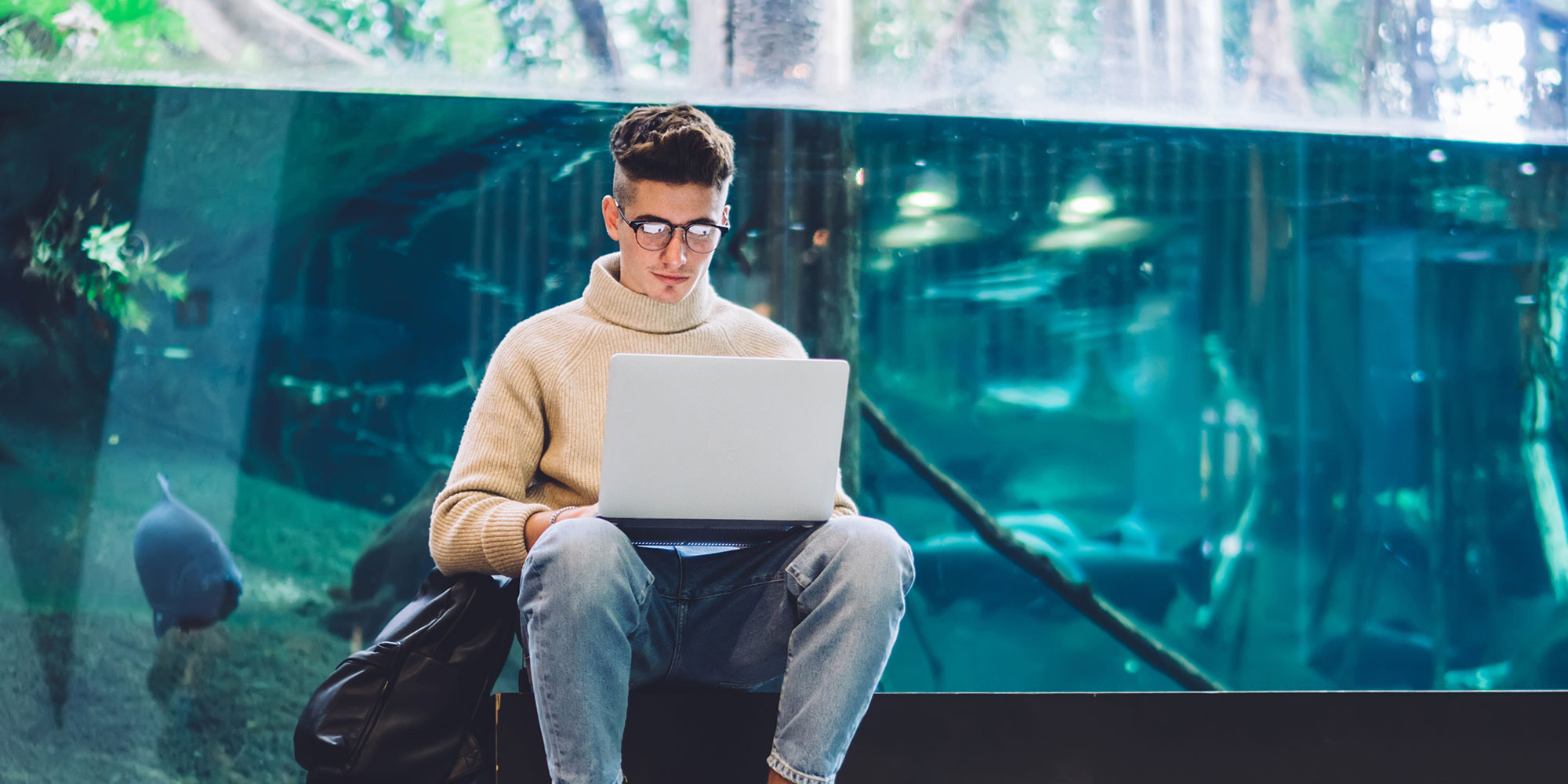 College Student In Front of Aquarium