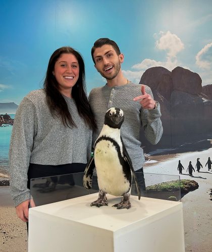 Girl and Penguin Photo